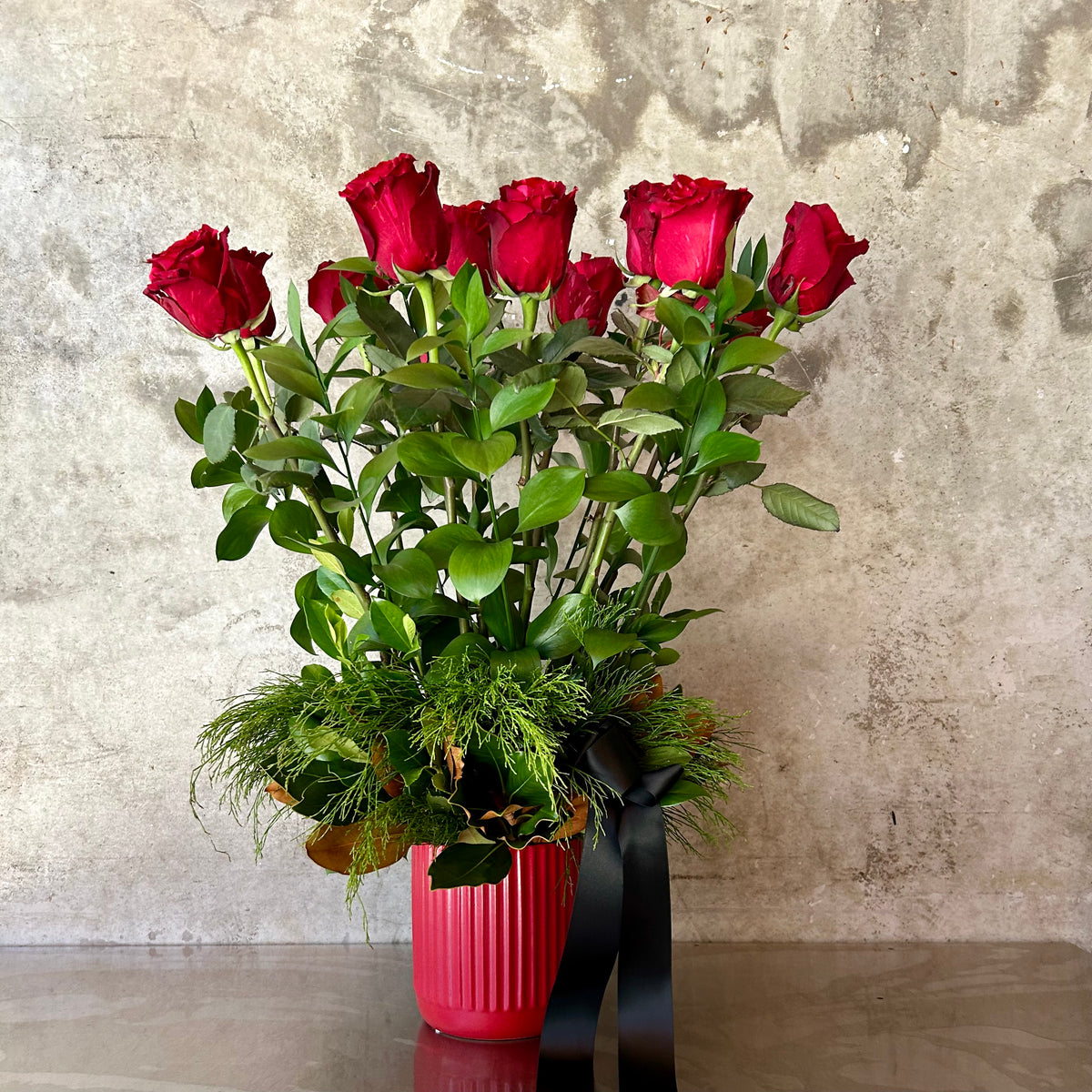 Seville premium red rose arrangement in ceramic vessel by James St Florist Brisbane