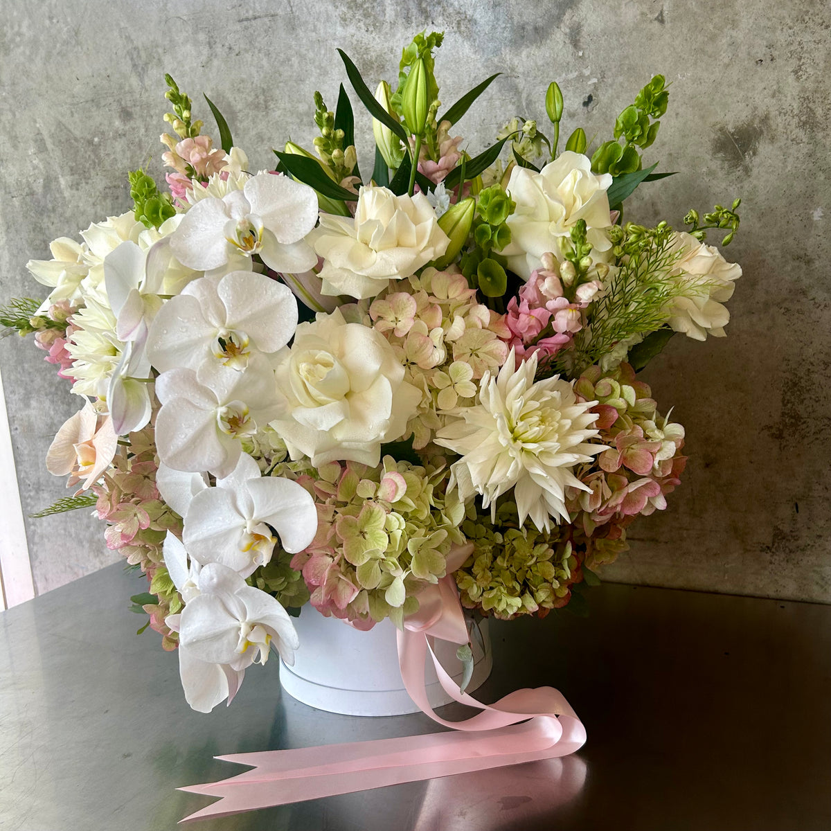 The Hatbox floral arrangement detail view by James St Florist Brisbane